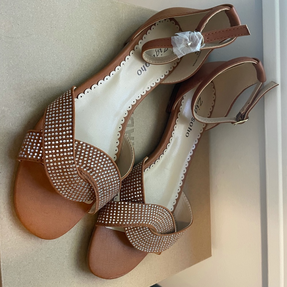 Brown and gold ankle strap sandals